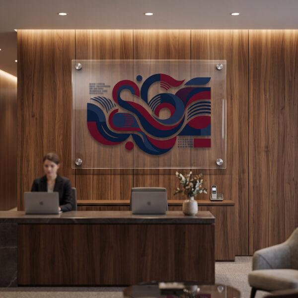 Acrylic lobby sign with standoffs behind a reception desk — Sign America Chicago