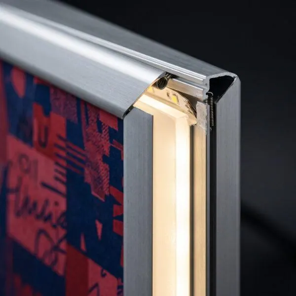 Close-up of LED light box snap frame edge and diffuser — Sign America Chicago