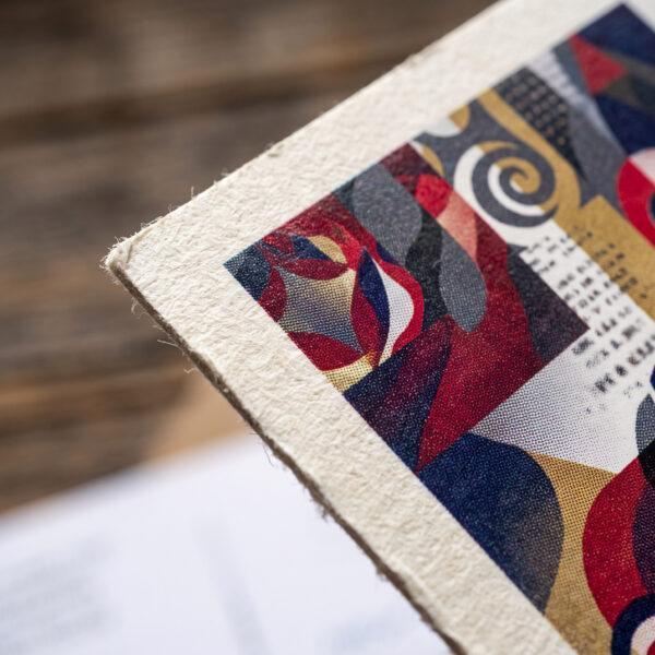 Close-up of thick postcard cardstock edge and coating — Sign America Chicago