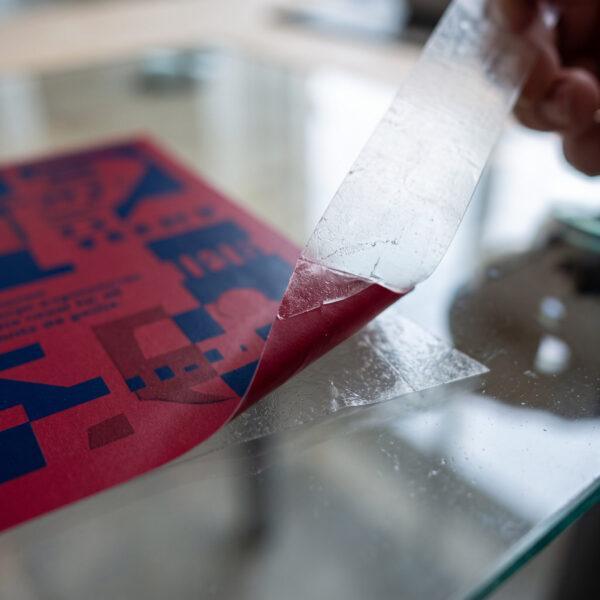 Close-up of a vinyl window decal with transfer tape — Sign America Chicago