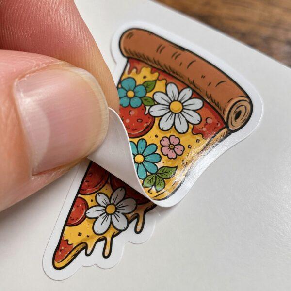 Peeling a die-cut sticker from its backing — waterproof vinyl stickers Sign America Chicago